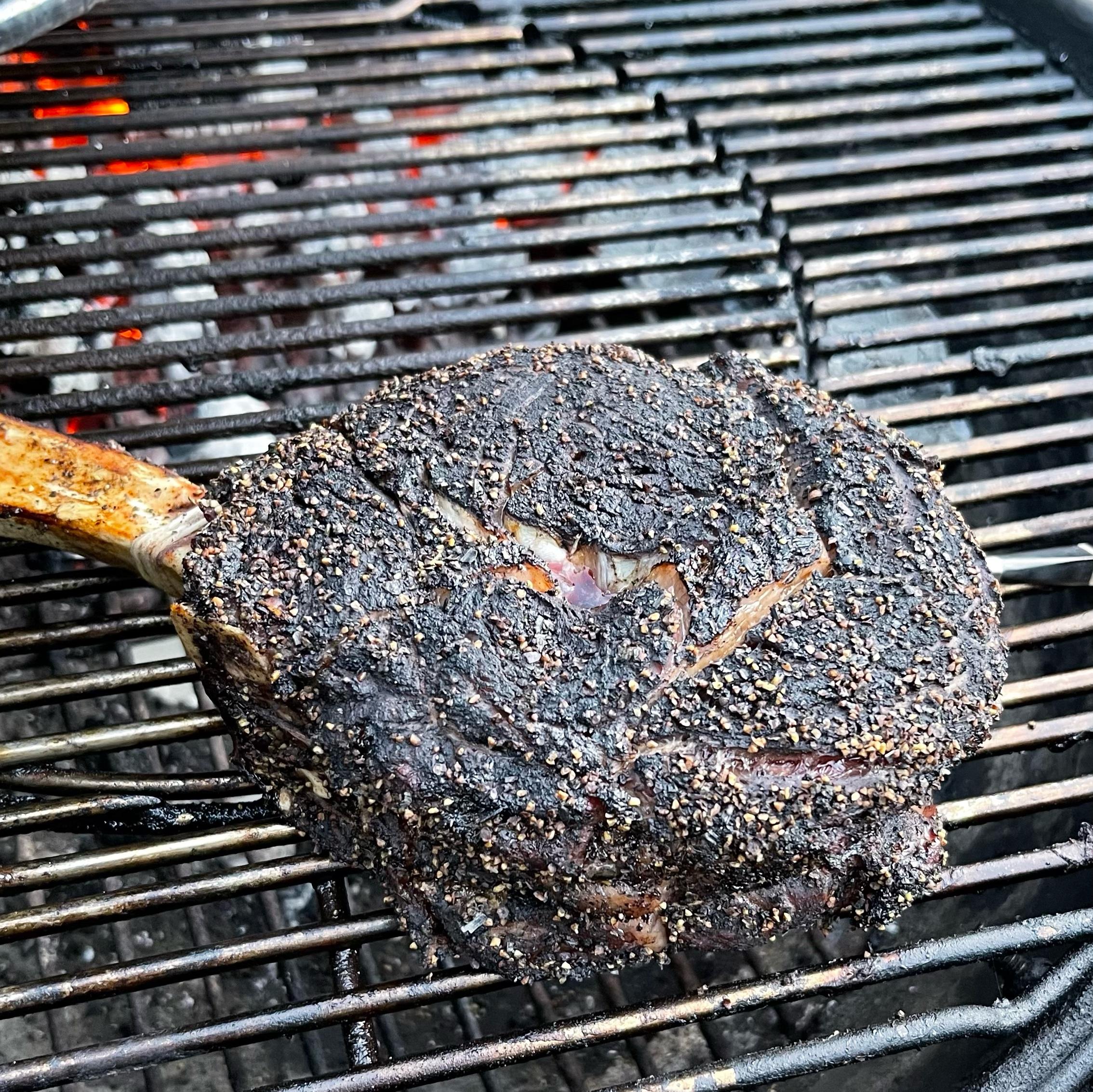 A whole rib eye seasoned in Moonshine BBQ Nero Steak Rub