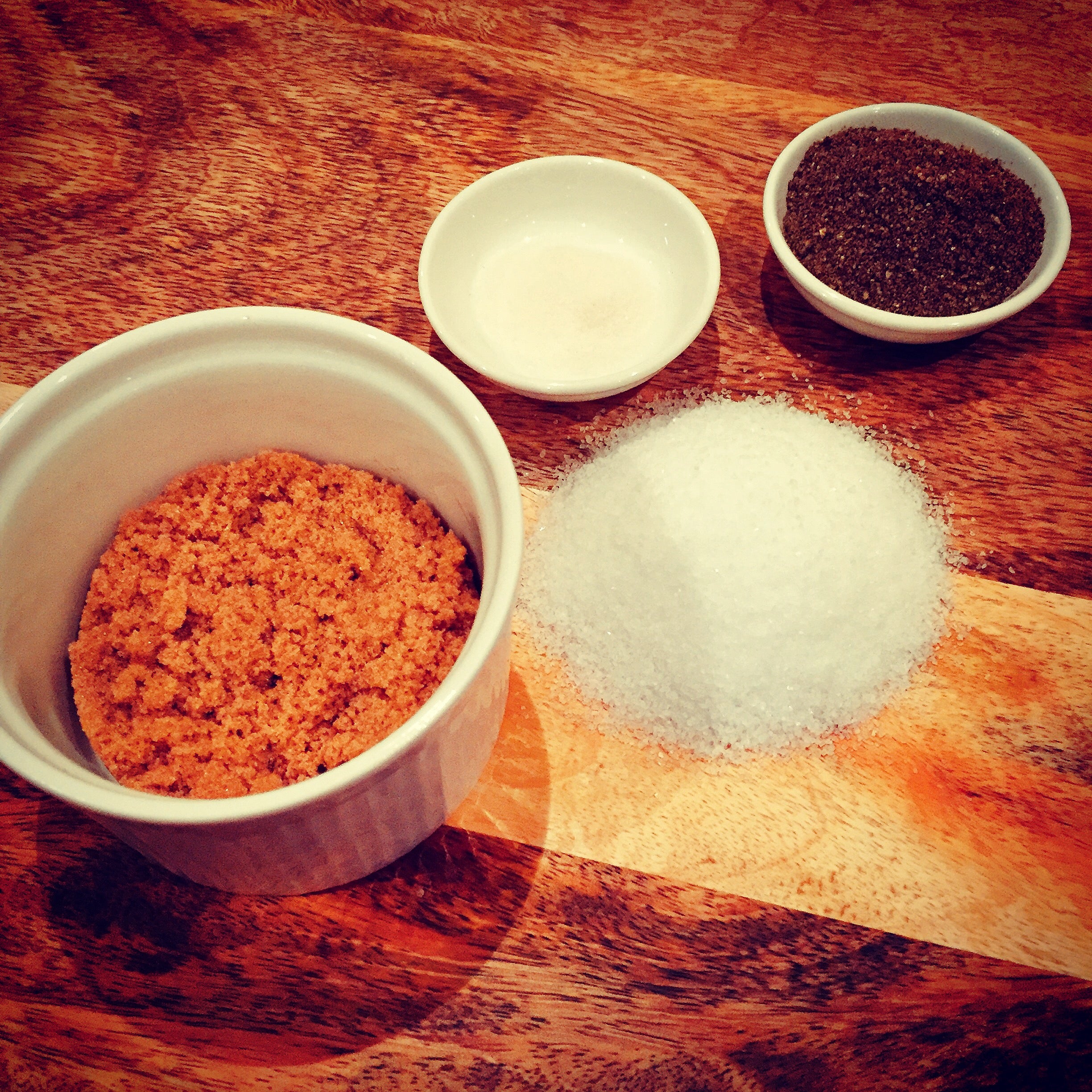 The key ingredients for curing bacon - salt, pepper, sugar, prague poweder